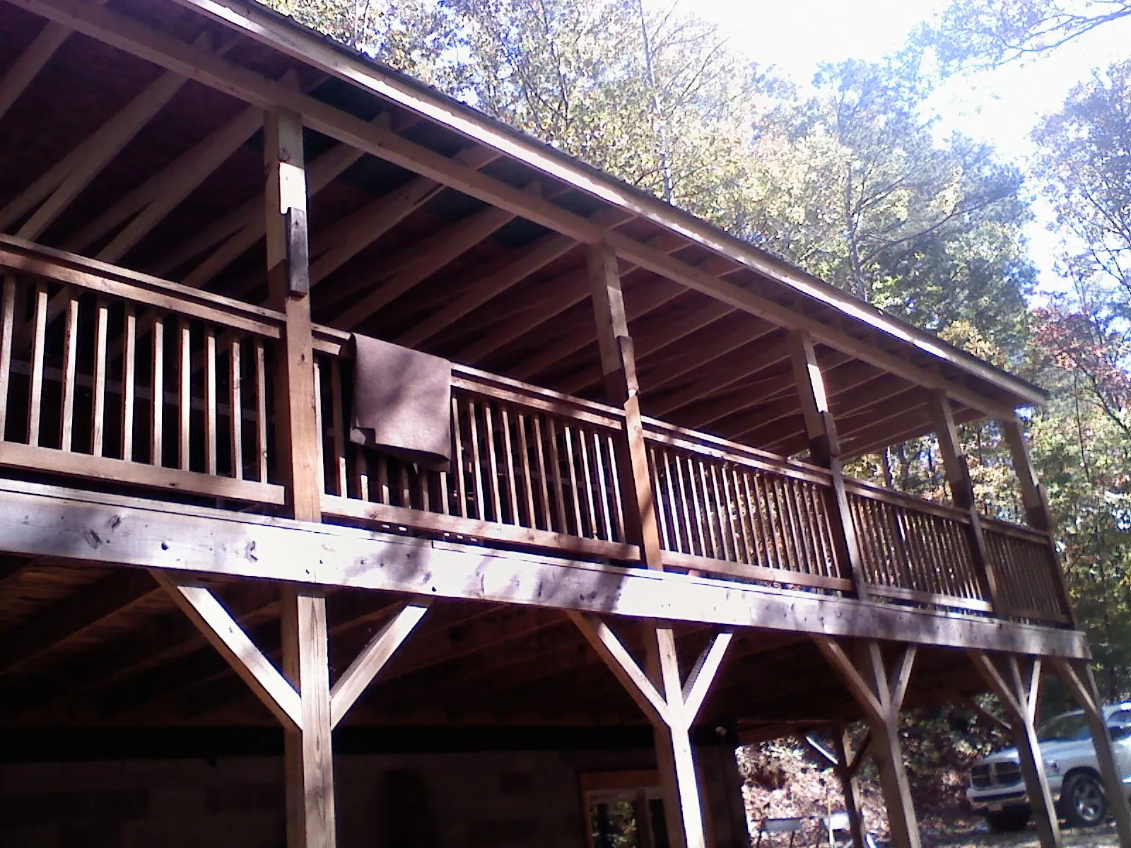 Timber framing under a new elevated porch and deck — Roof Leak Repair in Henrietta by Roofing Brothers